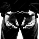 Photo Illustration: Man in handcuffs